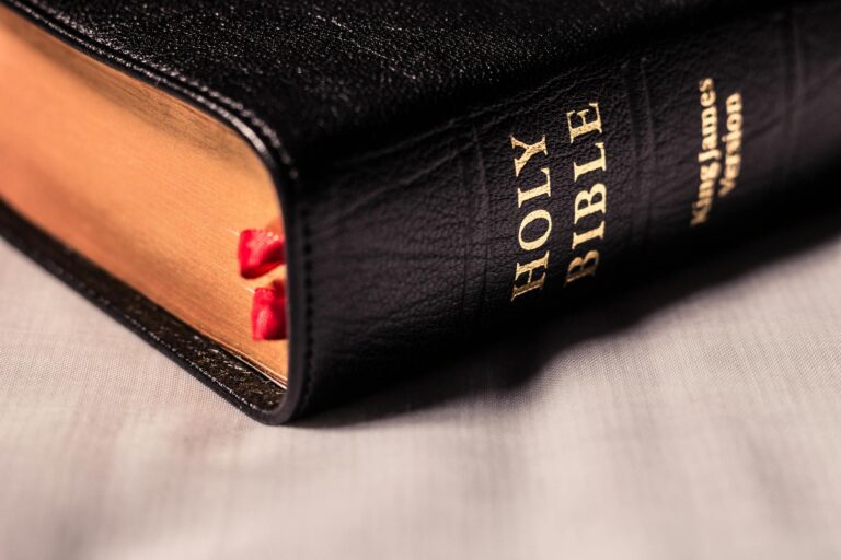 A close-up of the King James Version Bible with leather cover and gold lettering.